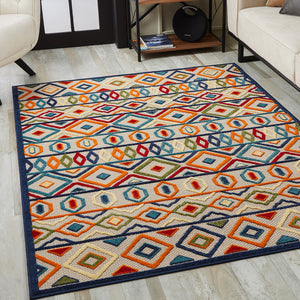 7' X 9' Ivory And Blue Southwestern Stain Resistant Indoor Outdoor Area Rug