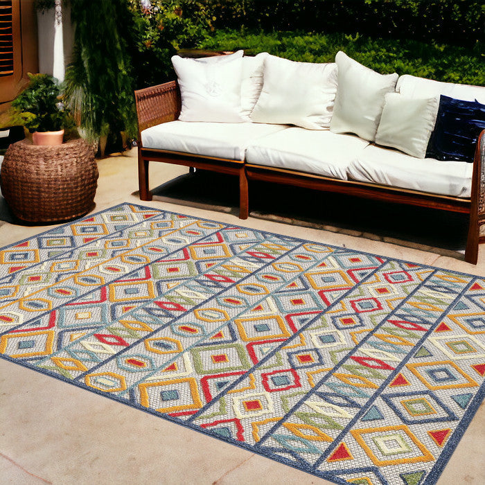 8' X 10' Ivory And Blue Southwestern Stain Resistant Indoor Outdoor Area Rug