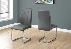 Two 77.5" Leather Look Chrome Metal And Foam Dining Chairs