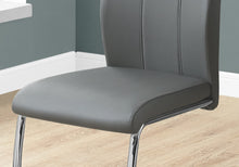Load image into Gallery viewer, Two 77.5&quot; Leather Look Chrome Metal And Foam Dining Chairs