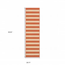 Load image into Gallery viewer, 5&#39; x 8&#39; Orange and Ivory Indoor Outdoor Area Rug